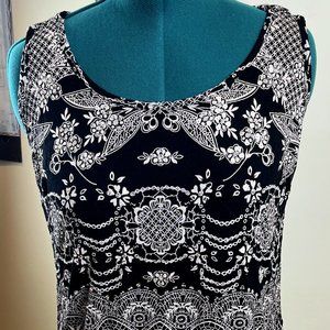 Black and White Sleeveless Blouse with Sequins and Lace